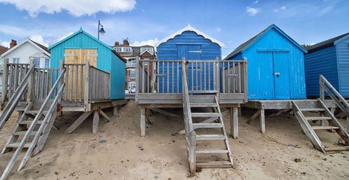 Beach huts against blue sky