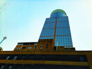 Low angle view of modern building against clear sky