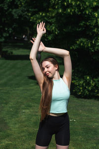 Woman exercising in park