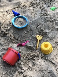 High angle view of toy on sand