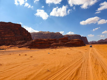 Scenic view of desert against sky