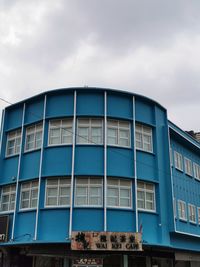 Low angle view of modern building against sky