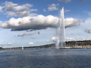 View of fountain against cloudy sky