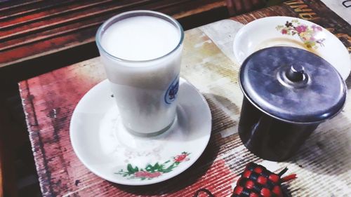 High angle view of coffee cup on table