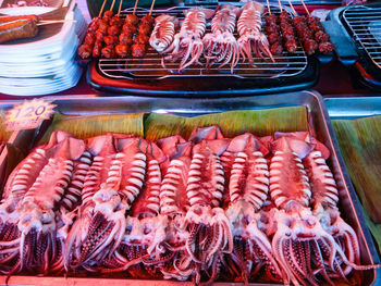 High angle view of grilles squids for sale in market
