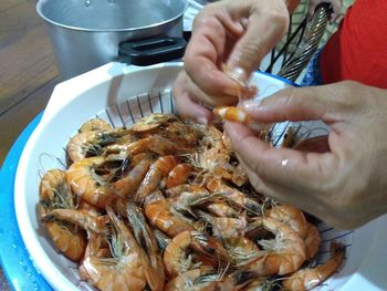 Close-up of man preparing food