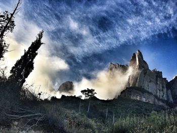 Low angle view of land against sky