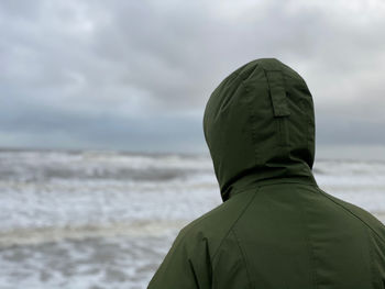 Rear view of woman on beach