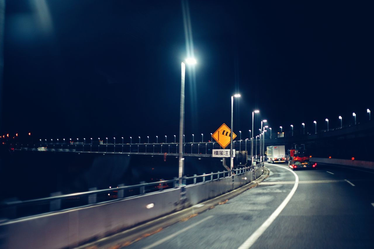 ROAD IN CITY AT NIGHT