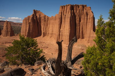 Rock formations on mountain against sky