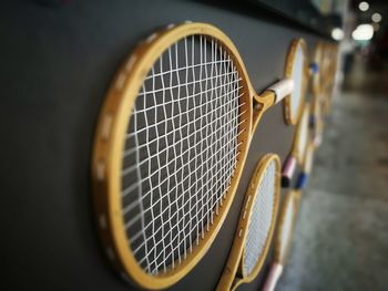 Close-up of badminton rackets for sale