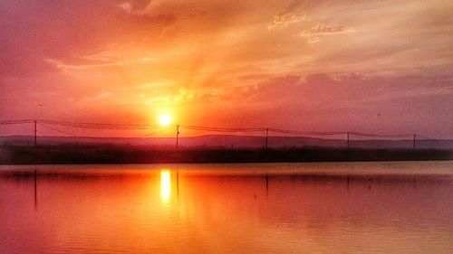 Scenic view of sea at sunset