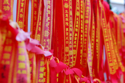 Close-up of clothes hanging on temple