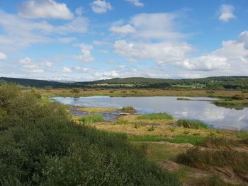 Scenic view of lake against sky