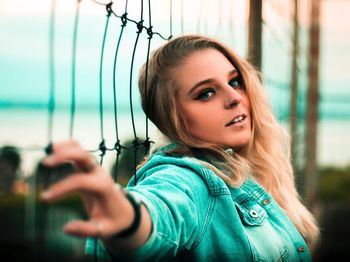 Portrait of beautiful young woman outdoors