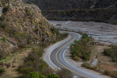 High angle view of road amidst trees