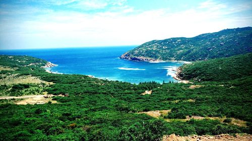 Scenic view of bay against sky