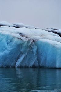 Scenic view of frozen lake against sky