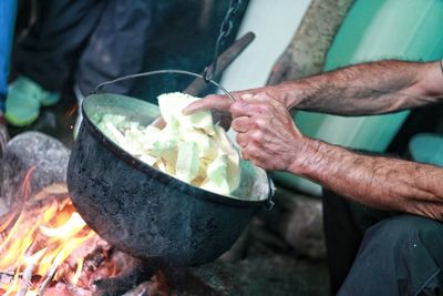 Close-up of hand holding ice cream