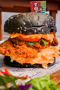 Close-up of burger in plate on table