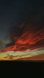 Scenic view of dramatic sky during sunset