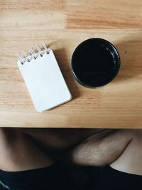 High angle view of black coffee on table