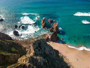 High angle view of rocks on beach