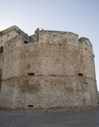 View of old ruins against clear sky