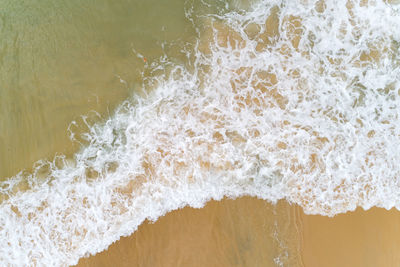 Close-up of wave splashing on shore