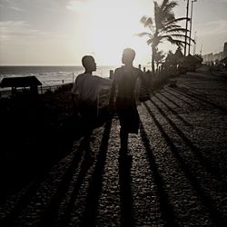 Silhouette of woman at seaside