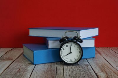 Close-up of clock on table