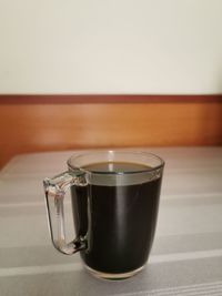 Close-up of coffee cup on table