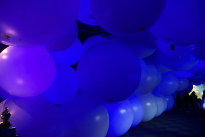 Low angle view of illuminated ceiling