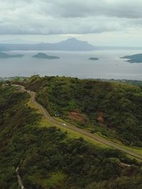 High angle view of road by sea against sky