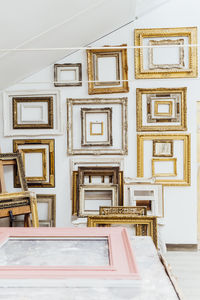 Wall full of frames in workshop