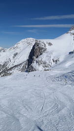 Scenic view of snowcapped mountain against sky