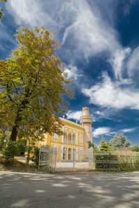 View of building against cloudy sky