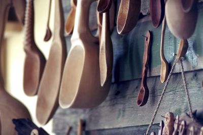 Close-up of clothes hanging on wood