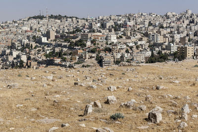 Aerial view of townscape against clear sky