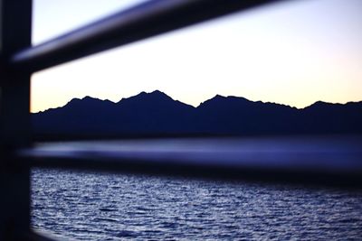 Scenic view of mountains against sky during sunset