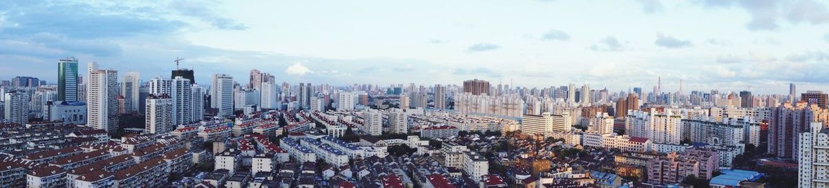 Panoramic view of cityscape against sky