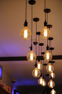 Low angle view of illuminated lamp