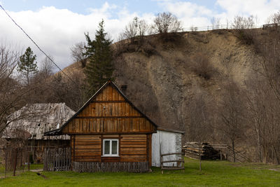 Wooden mountain house, mountain landscape