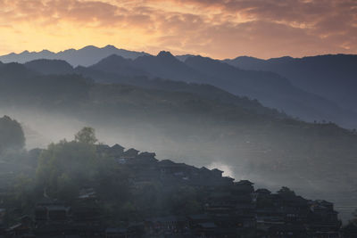 Scenic view of mountains against sky during sunset