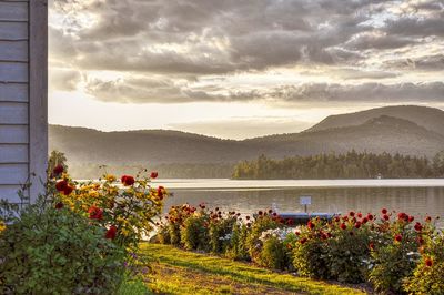 Scenic view of lake against cloudy sky