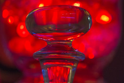 Close-up of illuminated red table