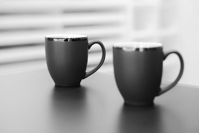 Close-up of coffee cup on table