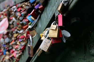 High angle view of love padlocks railing