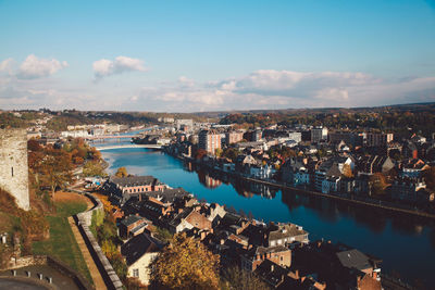 High angle view of city against cloudy sky