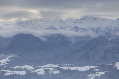 Scenic view of snowcapped mountains against sky